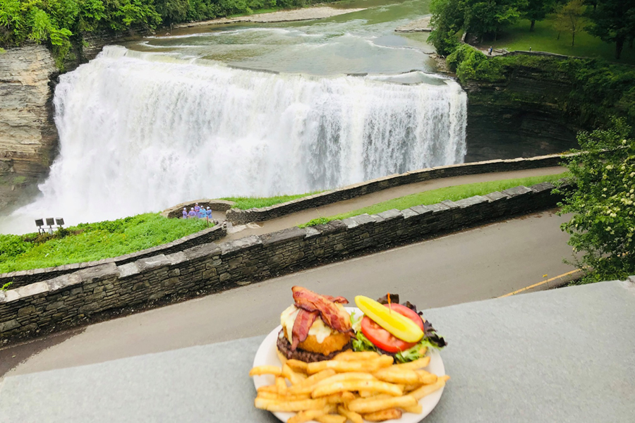 Waterfall in Letchworth State Park with burger in foreground